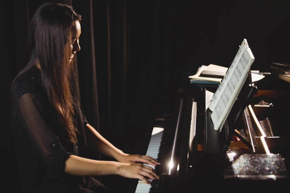 woman-playing-piano-music-studio-1